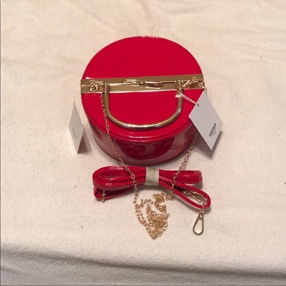 Red and Gold Patent convertible bag​​​​​​​​​​​​​​​​​​​​​​​